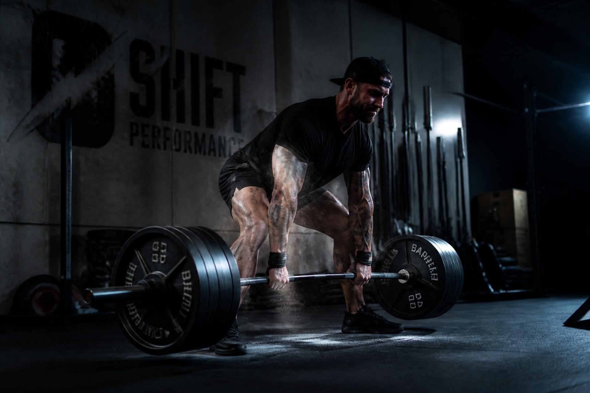 Athlete lifting a loaded barbell inside Relentless Gym
